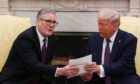 US President Donald Trump was presented with a letter from King Charles about a State visit during a previous meeting in Washington DC. Image: PA.
