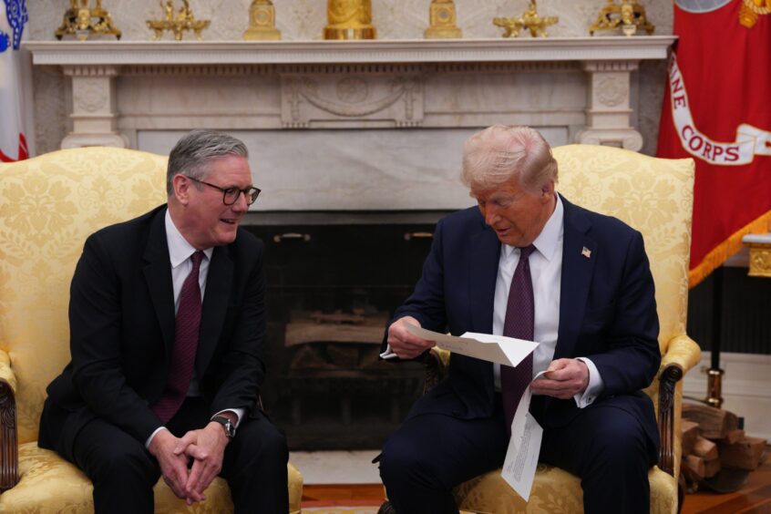 Starmer and Trump sitting side by side 