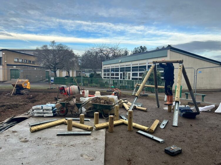 Playground equipment being installed