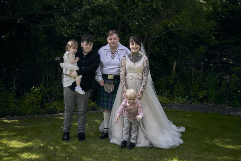 Kaden Askew, pictured with mum Gemma Tait, his step-dad David Tait and siblings Danny and Abi-lee. 