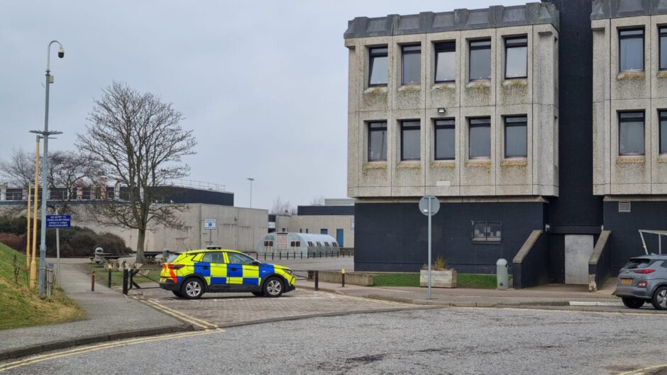 Police vehicle outside Dyce Academy.