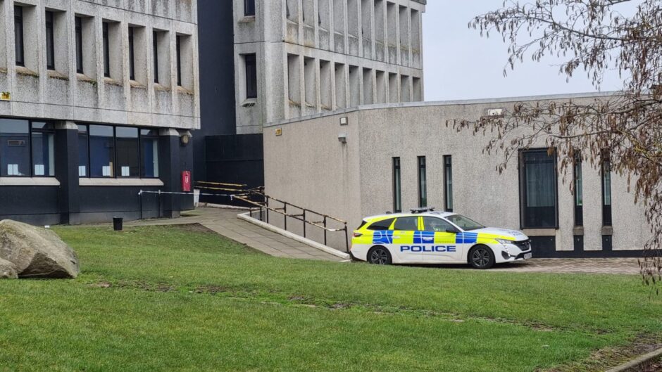 Police car pictured outside Dyce Academy.