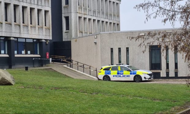 Police car pictured outside Dyce Academy.