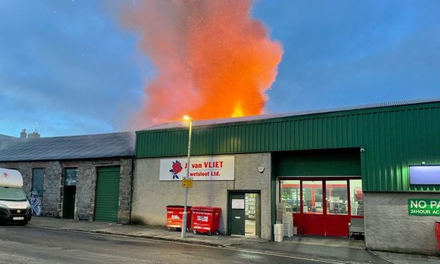 A fire spread to the building of J Van Vliet wholesale florist destroying the roof. Supplied by Paul McBain