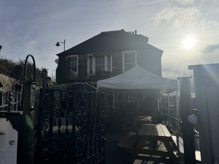 the beer garden and exterior of Castle Tavern in Inverness