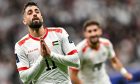 Oday Dabbagh celebrates a goal for Palestine against Qatar. Image: Shutterstock.