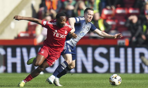 Aberdeen's Shayden Morris dribbles with the ball in the 4-1 win against Queen's Park at Pittodrie. Image: Shutterstock