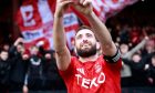 Aberdeen captain Graeme Shinnie takes a selfie in front of the fans in the Red Shed after the 4-1 Scottish Cup quarter-final win against Queen's Park