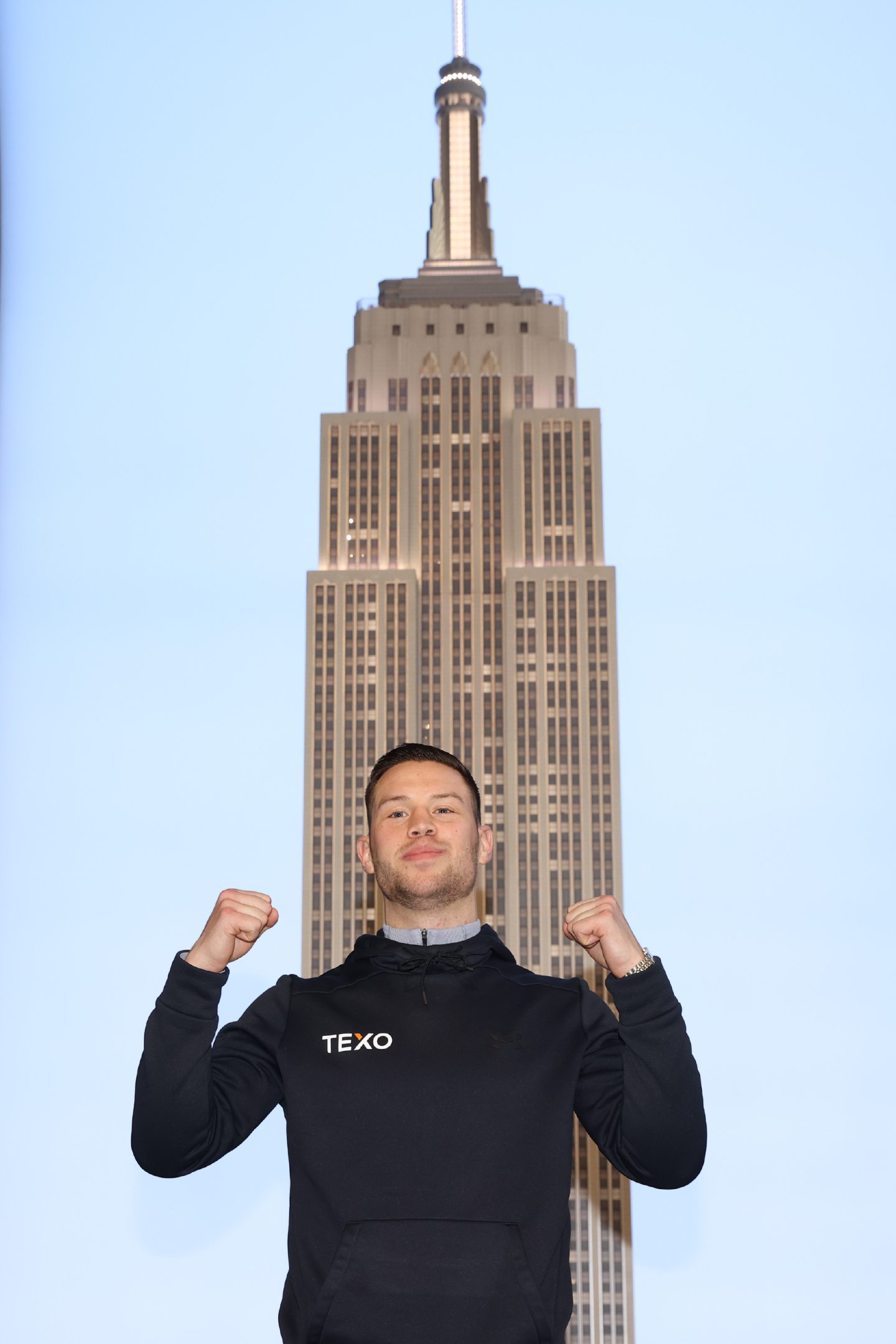 Aberdeen boxer Dean Sutherland pictured in New York with the Empire State Building towering behind him.