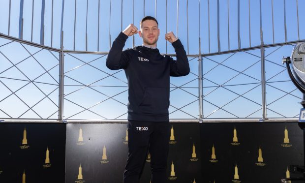 Boxer Dean Sutherland at the Empire State Building in New York ahead of his title fight against Callum Walsh.