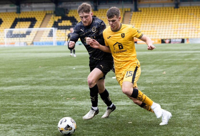 Inverness Caledonian Thistle midfielder Paul Allan, left, challenges Livingston's Lewis Smith during the SPFL Trust Trophy tie at the Set Fare Arena, Liivngston, on October 12, 2024.