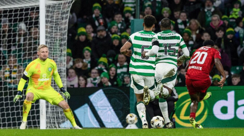 Aberdeen's Shayden Morris (R) drags a shot wide during a William Hill Premiership match at Celtic. Image: SNS.