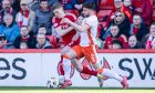 Aberdeen's Jack Mackenzie and Dundee United's Ryan Strain in action. Image: SNS.