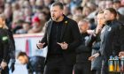 Aberdeen manager Jimmy Thelin directs his team from the dugout during the 2-2 draw with Dundee United at Pittodrie: