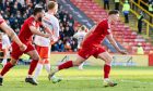 Aberdeen's Kevin Nisbet celebrates after scoring to make it 2-2 against Dundee United at Pittodrie. Image: SNS