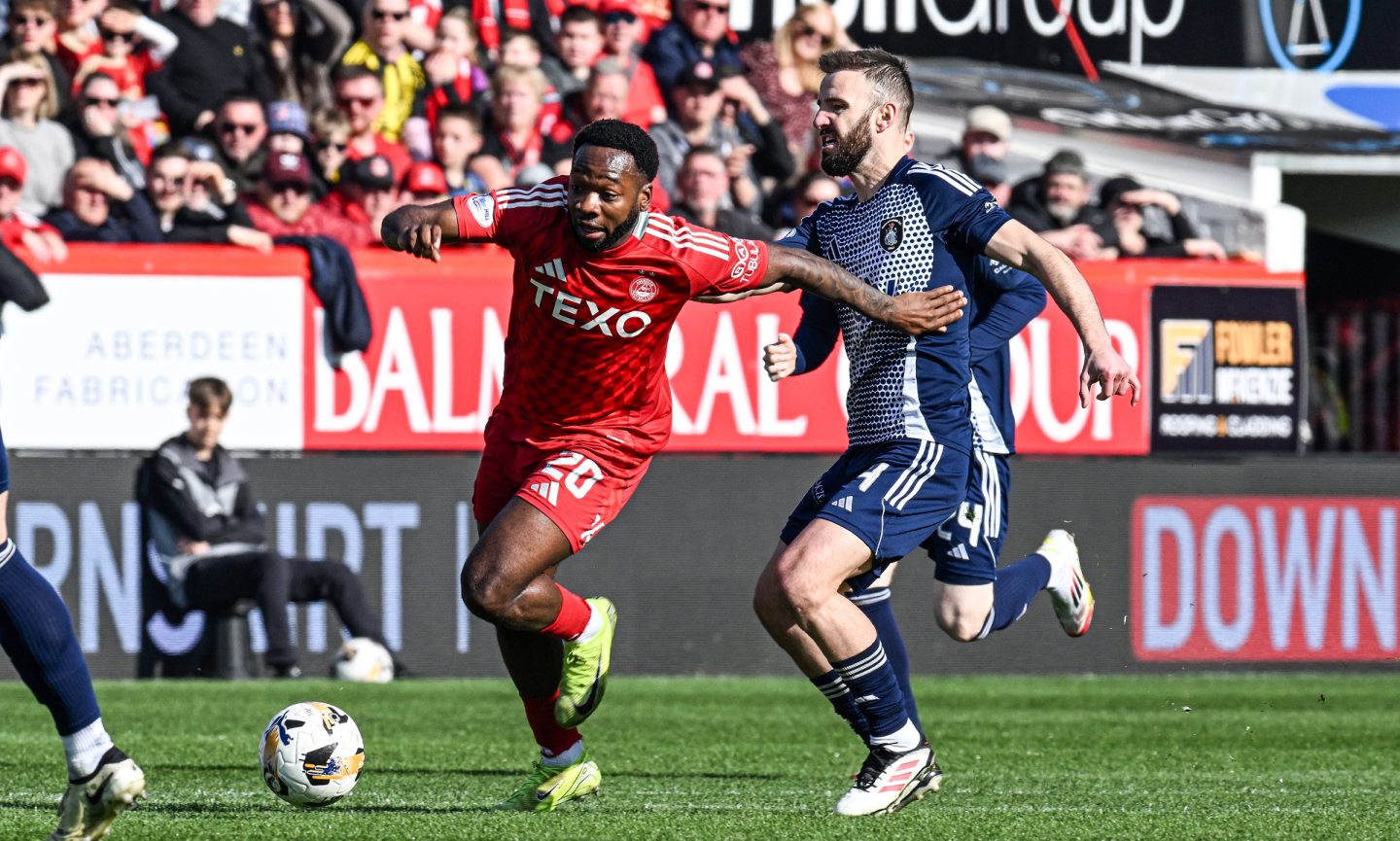 Aberdeen's Shayden Morris and Queen's Park's Sean Welsh in action during the Scottish Cup quarter-final at Pittodrie. Image: SNS