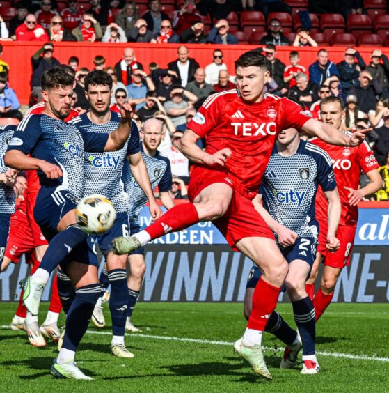 Aberdeen's Kevin Nisbet scores to make it 1-0 in the Scottish Cup quarter-final against Queen's Park at Pittodrie. Image: SNS