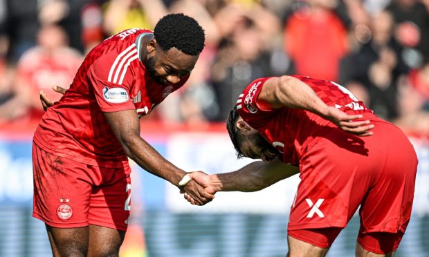 Aberdeen's Oday Dabbagh celebrates with Shayden Morris as he scores to make it 2-0 against Queen's Park in the Scottish Cup quarter-final at Pittodrie. Image: SNS