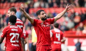 Aberdeen's Oday Dabbagh celebrates as he scores to make it 4-0 in the Scottish Cup quarter-final against Queen's Park. Image; SNS