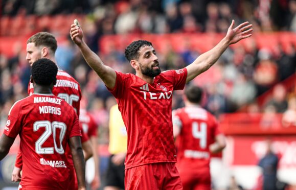 Aberdeen's Oday Dabbagh celebrates as he scores to make it 4-0 in the Scottish Cup quarter-final against Queen's Park. Image; SNS