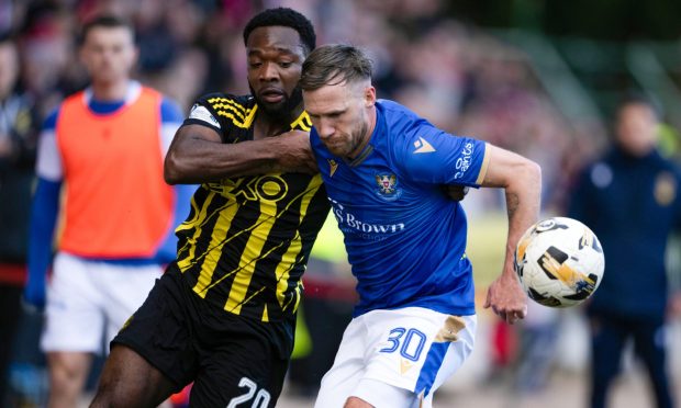 Aberdeen's Shayden Morris and St. Johnstone's Barry Douglas in action in Perth. Image: SNS