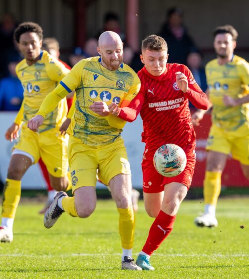 Brechin City's Euan Spark and Brora Rangers' Craig Mackenzie. Image: Jasperimage.