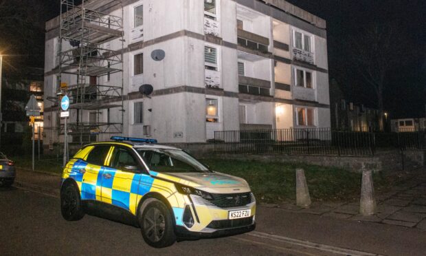 police at a block of flats in Aberdeen