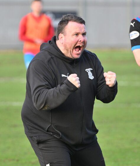 Inverness Caledonian Thistle Scott Kellacher in celebratory mood after his team's 1-0 SPFL Scottish League One win at Dumbarton on March 8, 2025. 