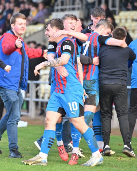 Celebrations for Inverness Caledonian Thistle's Alfie Bavidge, his team-mates, and the fans at full-time following the 1-0 SPFL League One win at Dumbarton on March 8, 2025. 