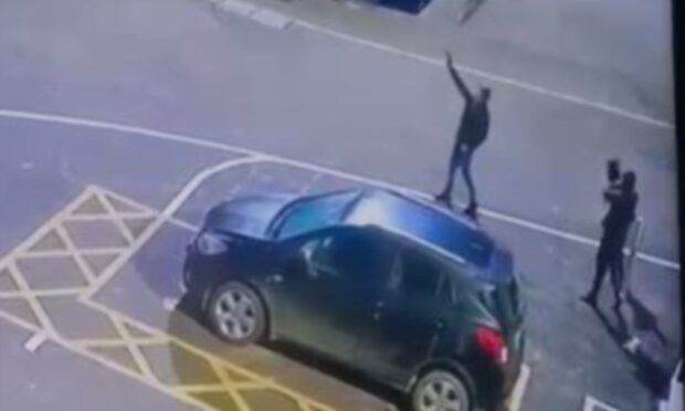 The handgun is fired into the sky at Fraserburgh Harbour.