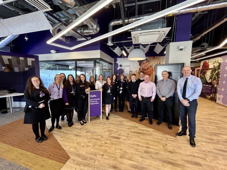 Royal Bank of Scotland’s Inverness branch manager, Claire Mezals, pictured with her fellow staff in a group photograph inside the new branch.