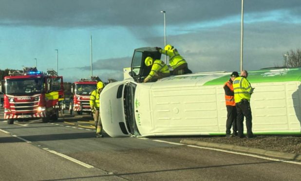 Van overturned on A92