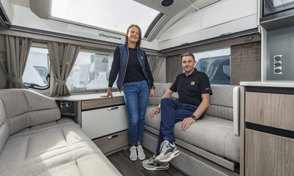 Donna and Stuart Harper inside caravan. 