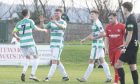 Buckie Thistle's Josh Peters, second from left, celebrates scoring their second goal against Brora Rangers. Pictures by Jason Hedges/DCT Thomson.