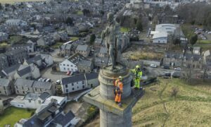 Workers pictured carrying out the work. Image: Jason Hedges/DC Thomson