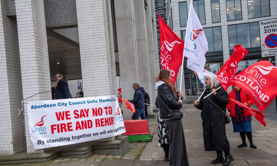 Protestors gathered outside the chambers before the debate over the "fire and rehire" scandal. Image: Kath Flannery/DC Thomson