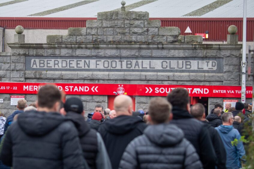 Fans arriving for Aberdeen FC's match with Hearts at Pittodrie in October. Image: Kami Thomson/DC Thomson