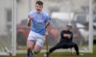 Craig Morrison scores for Caberfeidh. Lovat v Caberfeidh in the WM Donald MacTavish Cup, played at Balgate, Kiltarlity. Image: Neil G Paterson.