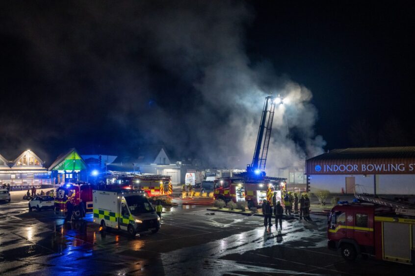 firefighters using high vehicle