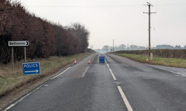 Police sign on A947