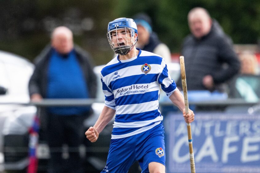 Joe Coyle celebrates a goal for Newtonmore against Kingussie in the Mowi Premiership earlier this year at The Eilan, Newtonmore.