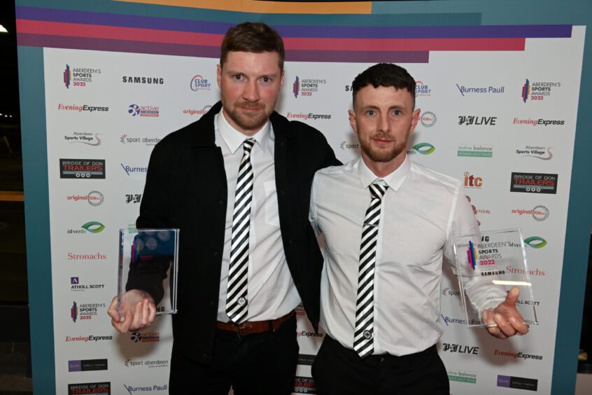 Daniel Kindness, left, after winning a volunteering prize at Aberdeen Sports Awards. Image: DC Thomson.