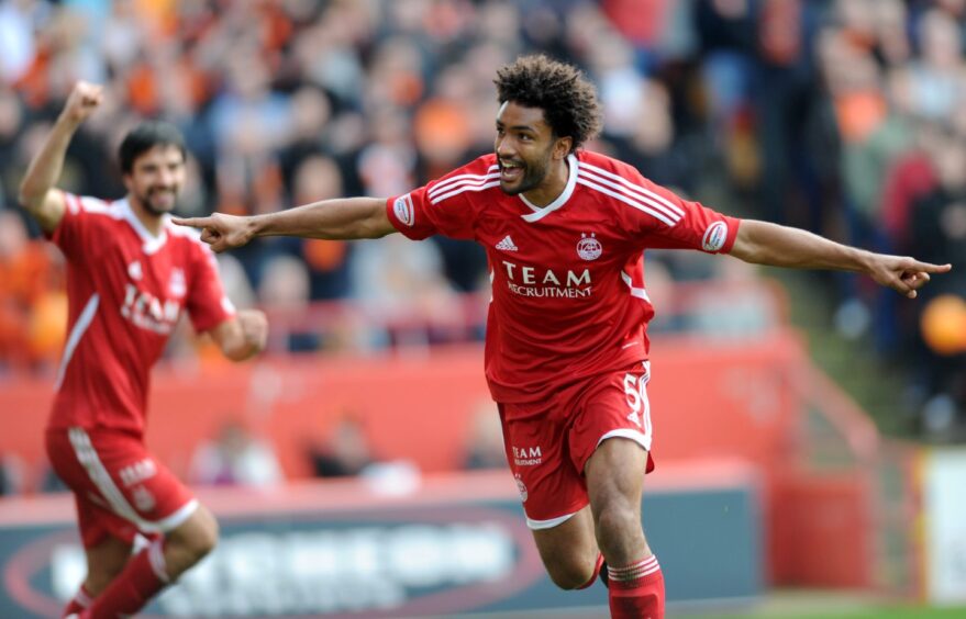 Youl Mawene celebrates scoring for Aberdeen against Dundee United on October 15, 2011. Image: Kami Thomson/DC Thomson.