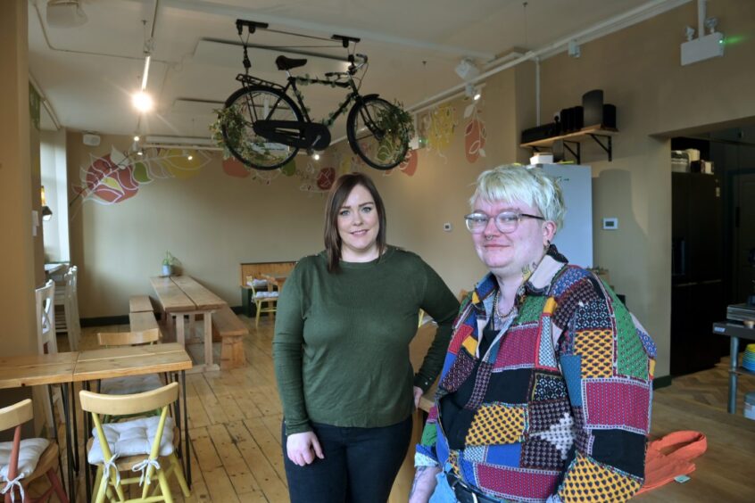 the owners inside the cafe