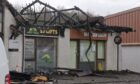 CR0052405
Ena Saracevic
Elgin
Police maintain their considerable presence at the fire ravaged shopping development at Fairways Business Park, Inverness following the overnight fire on Saturday night in to Sunday which destroyed the premises used by several businesses.
10th March '25
Sandy McCook/DC Thomson