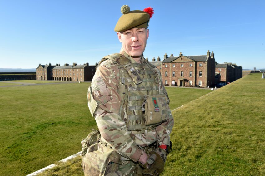 Major Ashley Pendlebury of 3 SCOTS with Fort George in the background.