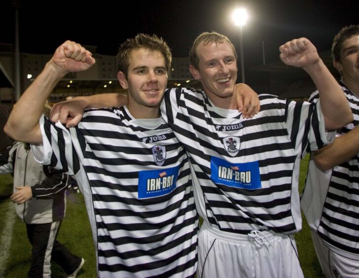 Alan Trouten and Robert Dunn (right) celebrate after knocking the Dons out of the League Cup. Image: SNS