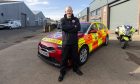 Blood Bikes volunteer Angus Beacom with the group's new car at its Torry HQ. Image: Scott Baxter/DC Thomson