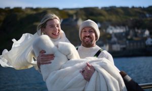 James Watt and Georgia Toffolo on the fishing boat for their wedding. Image: Supplied.