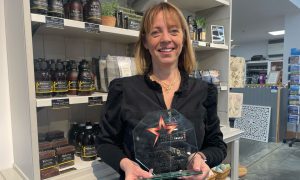 Emma Parton with her People's Choice Award in Fort William Highland Soap Company.